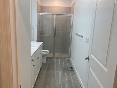 Step into modern comfort in this stunning 3-bedroom, 2-bathroom on Candler Hills Golf and Country Club in Florida - for sale on GolfHomes.com, golf home, golf lot
