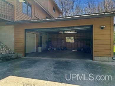 Custom-Built Rustic Retreat on Private Wooded Lot 3 Bed | 2 Bath on Irish Oaks Golf Course in Michigan - for sale on GolfHomes.com, golf home, golf lot