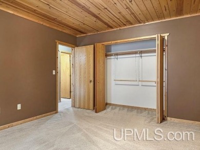 Custom-Built Rustic Retreat on Private Wooded Lot 3 Bed | 2 Bath on Irish Oaks Golf Course in Michigan - for sale on GolfHomes.com, golf home, golf lot