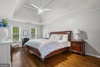 Nestled in the heart of Alpharetta this renovated home in on The Golf Club of Georgia in Georgia - for sale on GolfHomes.com, golf home, golf lot