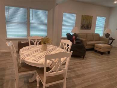 Step into modern comfort in this stunning 3-bedroom, 2-bathroom on Candler Hills Golf and Country Club in Florida - for sale on GolfHomes.com, golf home, golf lot