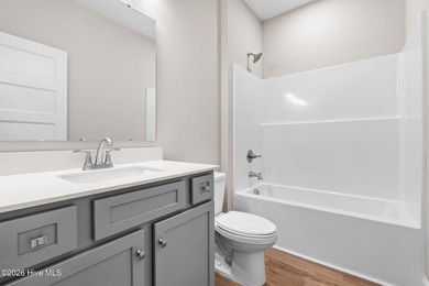 MOVE-IN READY! Discover the perfect blend of modern elegance and on Lockwood Folly Country Club in North Carolina - for sale on GolfHomes.com, golf home, golf lot