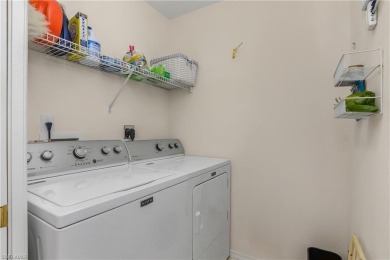 Rarely available, 2nd floor end unit with a detached 1 car on The Club At Strand in Florida - for sale on GolfHomes.com, golf home, golf lot