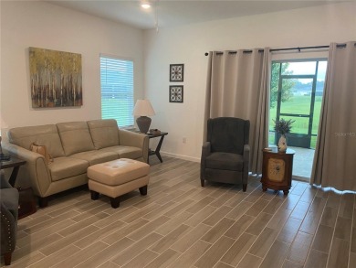 Step into modern comfort in this stunning 3-bedroom, 2-bathroom on Candler Hills Golf and Country Club in Florida - for sale on GolfHomes.com, golf home, golf lot