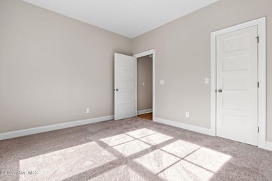 MOVE-IN READY! Discover the perfect blend of modern elegance and on Lockwood Folly Country Club in North Carolina - for sale on GolfHomes.com, golf home, golf lot