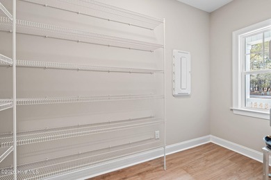 MOVE-IN READY! Discover the perfect blend of modern elegance and on Lockwood Folly Country Club in North Carolina - for sale on GolfHomes.com, golf home, golf lot