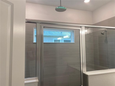Step into modern comfort in this stunning 3-bedroom, 2-bathroom on Candler Hills Golf and Country Club in Florida - for sale on GolfHomes.com, golf home, golf lot