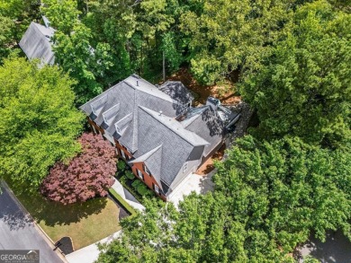 Nestled in the heart of Alpharetta this renovated home in on The Golf Club of Georgia in Georgia - for sale on GolfHomes.com, golf home, golf lot