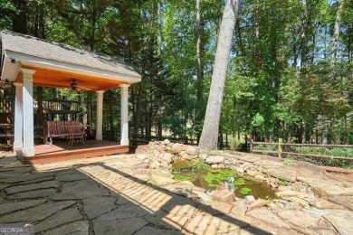 Welcome to your private retreat in the heart of Eagle Watch, one on Canongate At Eagle Watch Golf Club in Georgia - for sale on GolfHomes.com, golf home, golf lot