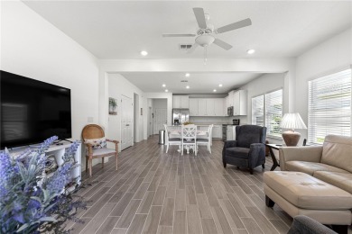 Step into modern comfort in this stunning 3-bedroom, 2-bathroom on Candler Hills Golf and Country Club in Florida - for sale on GolfHomes.com, golf home, golf lot