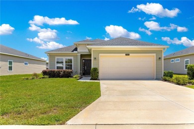 Step into modern comfort in this stunning 3-bedroom, 2-bathroom on Candler Hills Golf and Country Club in Florida - for sale on GolfHomes.com, golf home, golf lot
