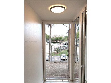 CHARMING 2 bed/ 2 bath, 3RD FLOOR LAKE FRONT CONDO located in on Sunrise Lakes Phase IV Golf Course in Florida - for sale on GolfHomes.com, golf home, golf lot