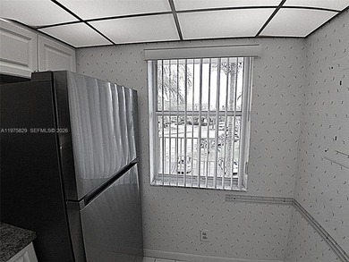 CHARMING 2 bed/ 2 bath, 3RD FLOOR LAKE FRONT CONDO located in on Sunrise Lakes Phase IV Golf Course in Florida - for sale on GolfHomes.com, golf home, golf lot