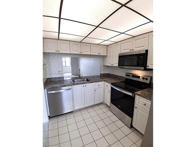 CHARMING 2 bed/ 2 bath, 3RD FLOOR LAKE FRONT CONDO located in on Sunrise Lakes Phase IV Golf Course in Florida - for sale on GolfHomes.com, golf home, golf lot