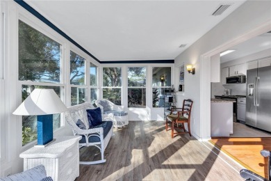 This elegant home features stunning hardwood floors throughout on Highland Lakes Executive Golf Course in Florida - for sale on GolfHomes.com, golf home, golf lot
