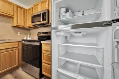 This move-in-ready gem welcomes you with beautiful luxury vinyl on Kings Point Executive Golf Course in Florida - for sale on GolfHomes.com, golf home, golf lot