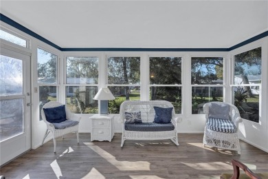 This elegant home features stunning hardwood floors throughout on Highland Lakes Executive Golf Course in Florida - for sale on GolfHomes.com, golf home, golf lot