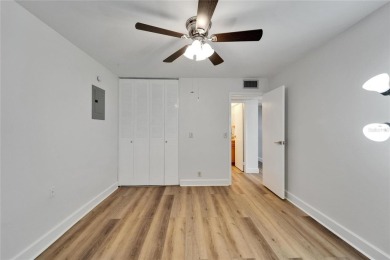 This move-in-ready gem welcomes you with beautiful luxury vinyl on Kings Point Executive Golf Course in Florida - for sale on GolfHomes.com, golf home, golf lot
