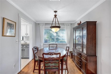 This elegant home features stunning hardwood floors throughout on Highland Lakes Executive Golf Course in Florida - for sale on GolfHomes.com, golf home, golf lot