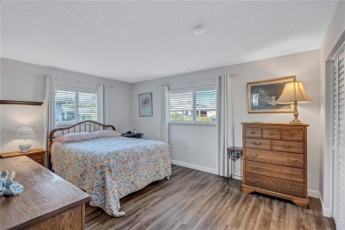 This elegant home features stunning hardwood floors throughout on Highland Lakes Executive Golf Course in Florida - for sale on GolfHomes.com, golf home, golf lot