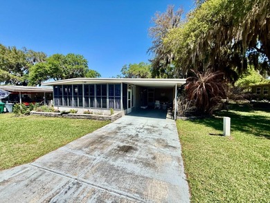 Home is located in Water Oak Country Club Estates, an active 55 on Water Oak Country Club Estates in Florida - for sale on GolfHomes.com, golf home, golf lot