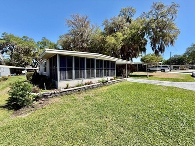 Home is located in Water Oak Country Club Estates, an active 55 on Water Oak Country Club Estates in Florida - for sale on GolfHomes.com, golf home, golf lot