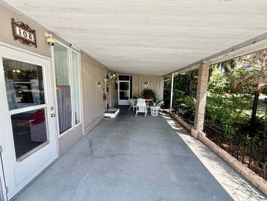 Home is located in Water Oak Country Club Estates, an active 55 on Water Oak Country Club Estates in Florida - for sale on GolfHomes.com, golf home, golf lot