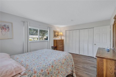 This elegant home features stunning hardwood floors throughout on Highland Lakes Executive Golf Course in Florida - for sale on GolfHomes.com, golf home, golf lot