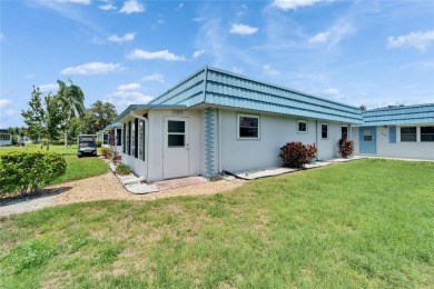 This move-in-ready gem welcomes you with beautiful luxury vinyl on Kings Point Executive Golf Course in Florida - for sale on GolfHomes.com, golf home, golf lot