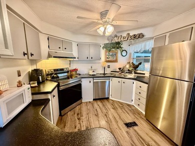 Home is located in Water Oak Country Club Estates, an active 55 on Water Oak Country Club Estates in Florida - for sale on GolfHomes.com, golf home, golf lot