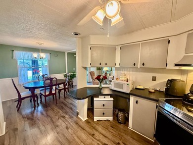 Home is located in Water Oak Country Club Estates, an active 55 on Water Oak Country Club Estates in Florida - for sale on GolfHomes.com, golf home, golf lot