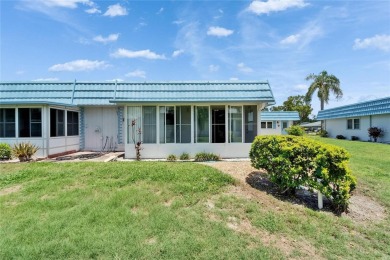 This move-in-ready gem welcomes you with beautiful luxury vinyl on Kings Point Executive Golf Course in Florida - for sale on GolfHomes.com, golf home, golf lot
