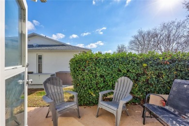 This elegant home features stunning hardwood floors throughout on Highland Lakes Executive Golf Course in Florida - for sale on GolfHomes.com, golf home, golf lot