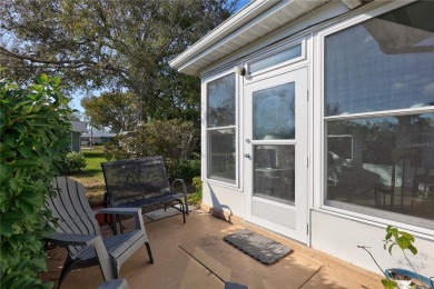 This elegant home features stunning hardwood floors throughout on Highland Lakes Executive Golf Course in Florida - for sale on GolfHomes.com, golf home, golf lot
