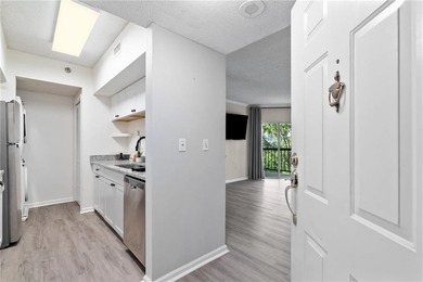 Experience lush tree canopy views from this beautifully on Bobby Jones Golf Club in Georgia - for sale on GolfHomes.com, golf home, golf lot