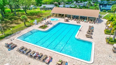 This elegant home features stunning hardwood floors throughout on Highland Lakes Executive Golf Course in Florida - for sale on GolfHomes.com, golf home, golf lot