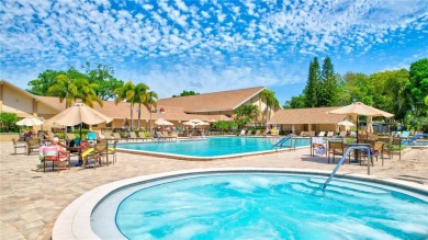 This elegant home features stunning hardwood floors throughout on Highland Lakes Executive Golf Course in Florida - for sale on GolfHomes.com, golf home, golf lot