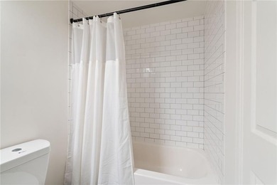 Experience lush tree canopy views from this beautifully on Bobby Jones Golf Club in Georgia - for sale on GolfHomes.com, golf home, golf lot