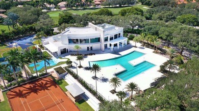 Newly Priced.  Totally renovated 5 Bedroom residence with on Boca Grove Golf and Tennis in Florida - for sale on GolfHomes.com, golf home, golf lot