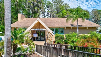 This elegant home features stunning hardwood floors throughout on Highland Lakes Executive Golf Course in Florida - for sale on GolfHomes.com, golf home, golf lot