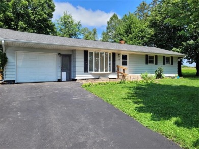 This gorgeous home is newly remodeled with 4 bedrooms and 2 full on Ellsworth Country Club in Wisconsin - for sale on GolfHomes.com, golf home, golf lot