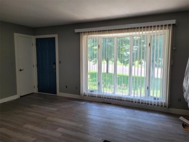 This gorgeous home is newly remodeled with 4 bedrooms and 2 full on Ellsworth Country Club in Wisconsin - for sale on GolfHomes.com, golf home, golf lot