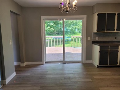 This gorgeous home is newly remodeled with 4 bedrooms and 2 full on Ellsworth Country Club in Wisconsin - for sale on GolfHomes.com, golf home, golf lot