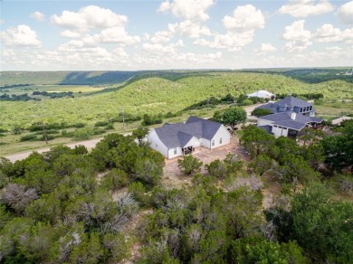 Live elevated at this new built 3-bedroom, 2-bathroom retreat on The Cliffs Resort in Texas - for sale on GolfHomes.com, golf home, golf lot