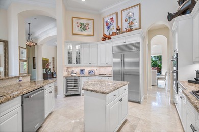 This stunning and meticulously maintained two-story courtyard on Country Club At Mirasol in Florida - for sale on GolfHomes.com, golf home, golf lot