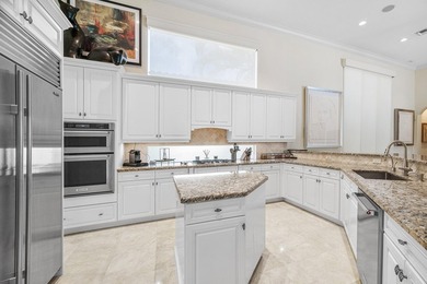 This stunning and meticulously maintained two-story courtyard on Country Club At Mirasol in Florida - for sale on GolfHomes.com, golf home, golf lot