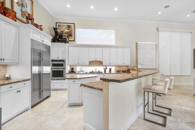 This stunning and meticulously maintained two-story courtyard on Country Club At Mirasol in Florida - for sale on GolfHomes.com, golf home, golf lot