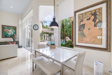 This stunning and meticulously maintained two-story courtyard on Country Club At Mirasol in Florida - for sale on GolfHomes.com, golf home, golf lot