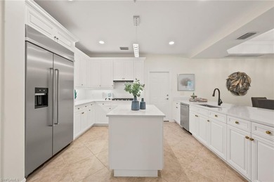Come experience ultimate privacy in this stunning 1st floor on Tiburon Golf Club in Florida - for sale on GolfHomes.com, golf home, golf lot