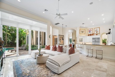 This stunning and meticulously maintained two-story courtyard on Country Club At Mirasol in Florida - for sale on GolfHomes.com, golf home, golf lot